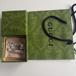 Gucci signature bracelet with GG tag